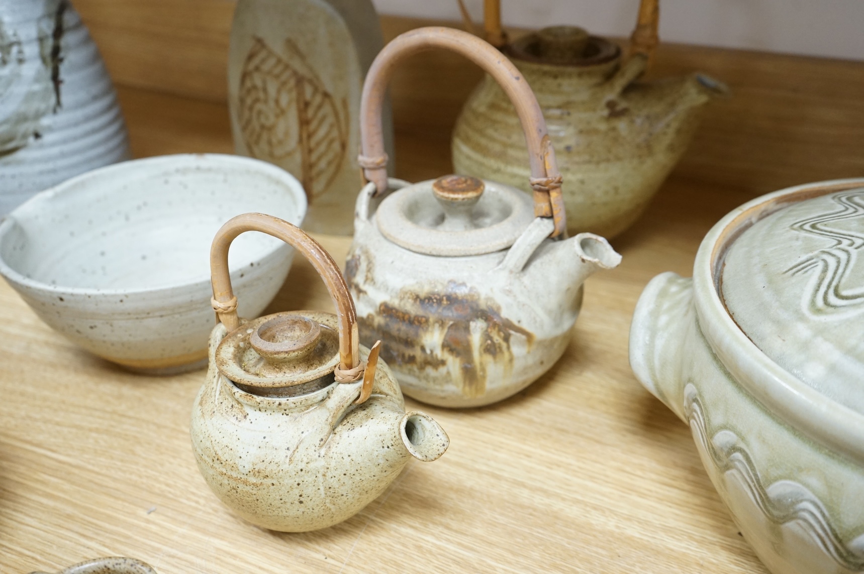 A collection of large Studio pottery vases teapots bowls and tureens (12). Tallest 27cm high
